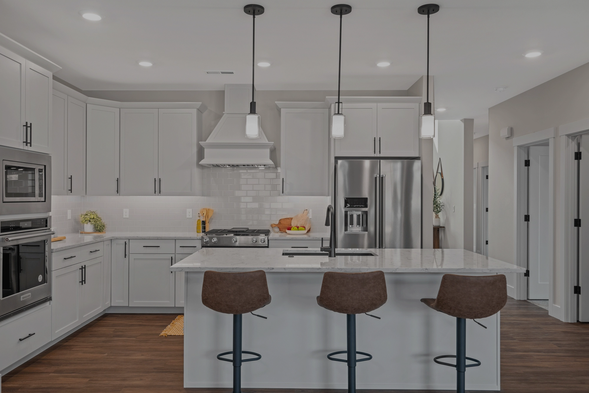 Photo of a modern designed kitchen in a Lexar home