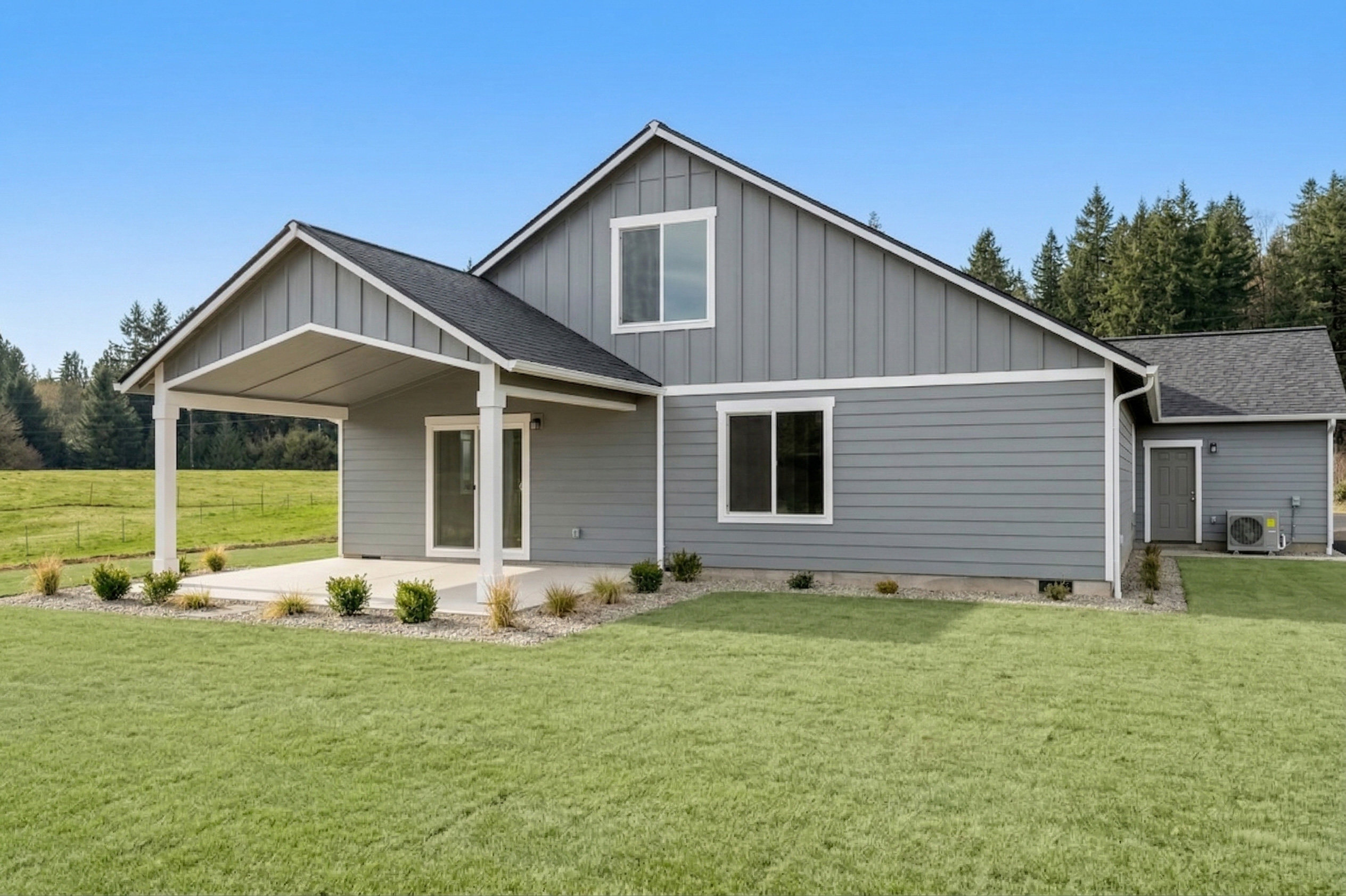 founders Collection covered back porch — clean exterior with covered patio and open backyard