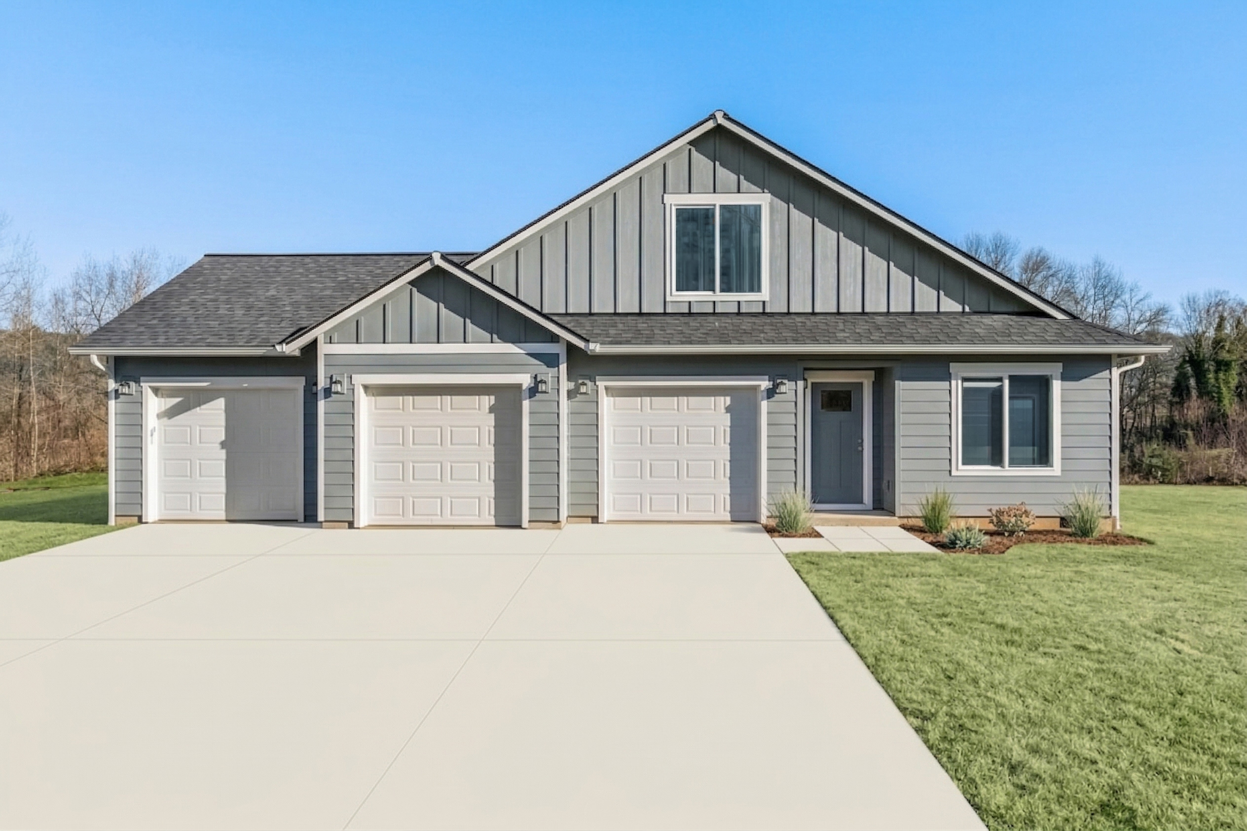 founders Collection exterior — clean craftsman-style home with three-car garage